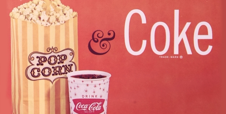 Image of an ad for Coca-Cola and popcorn at the movies Image of an ad for Coca-Cola and popcorn at the movies