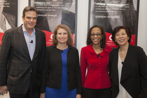 Panelists in front of the Uncovering Bias art exhibit