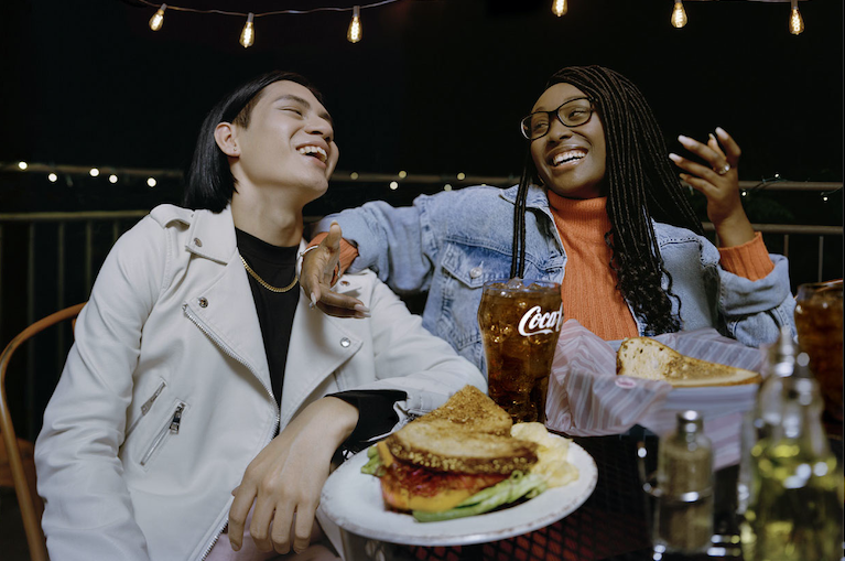 Friends enjoying meal outdoors