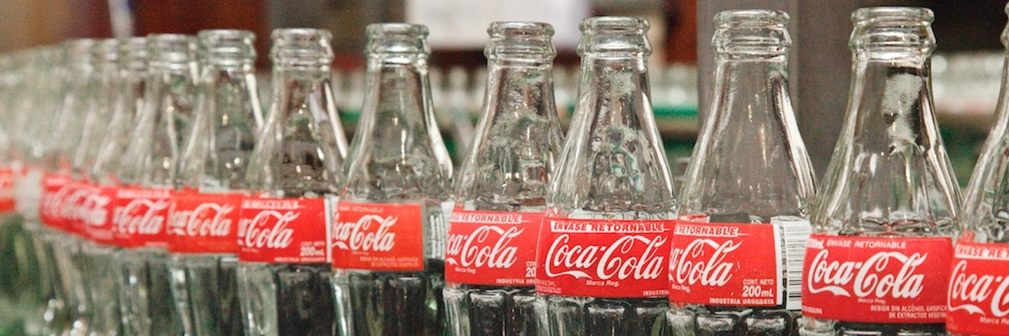 Coca-Cola glass bottles in a production line Coca-Cola glass bottles in a production line