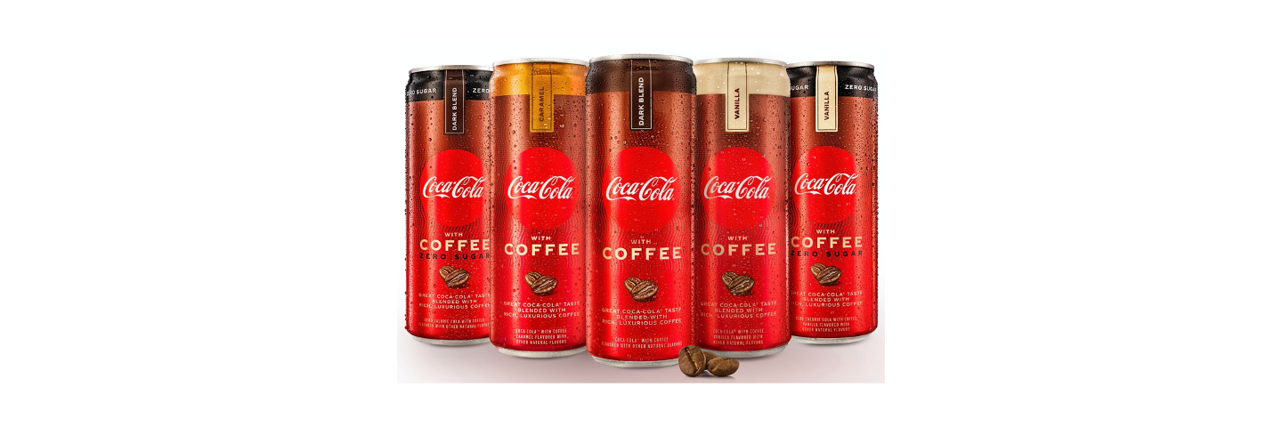 Four Coca-Cola with Coffee cans and one Coca-Cola with Coffee Zero Sugar can. Four Coca-Cola with Coffee cans and one Coca-Cola with Coffee Zero Sugar can.