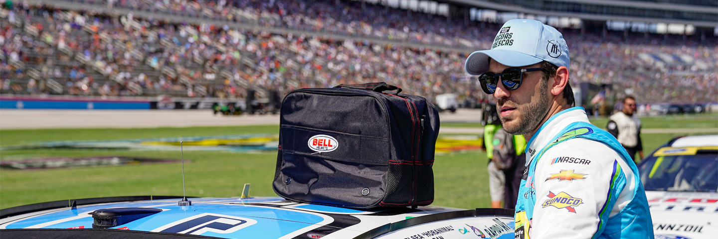 driver daniel suarez sits out his car window