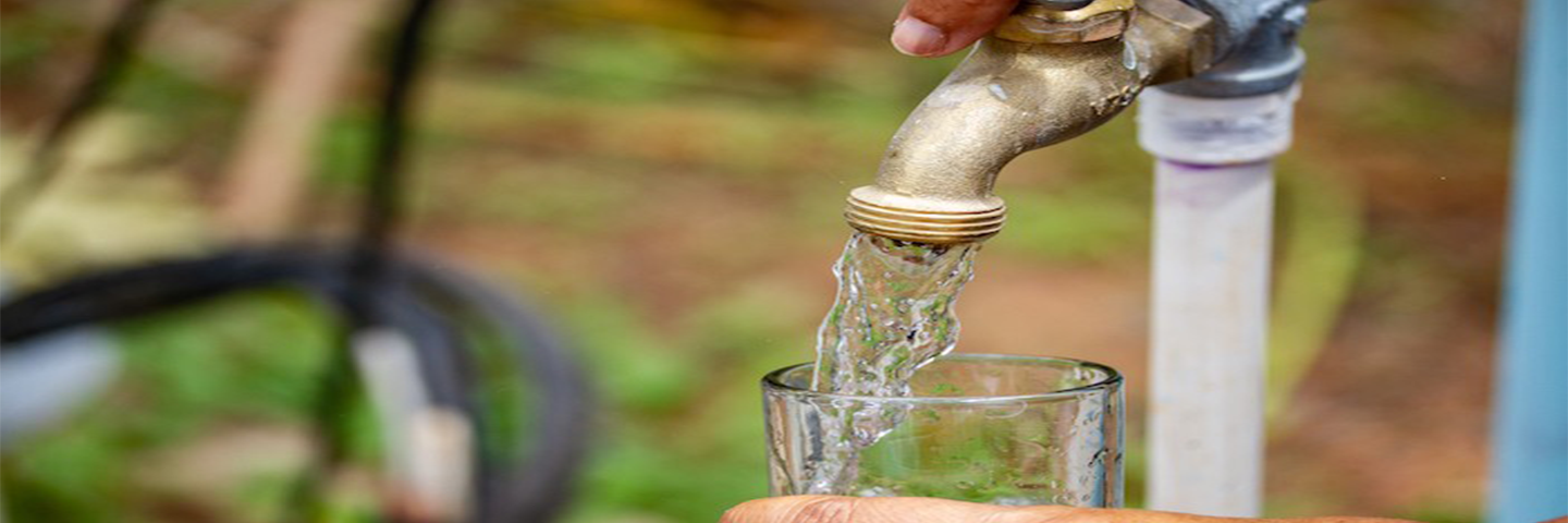 pouring water in a glass