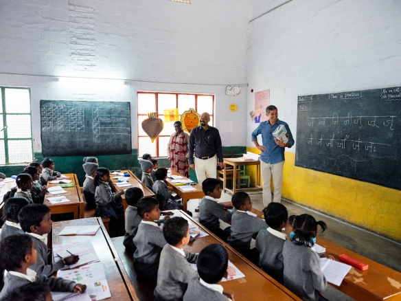 Seth Goldman greets students in a school built from Fair Trade premiums in Southern India.