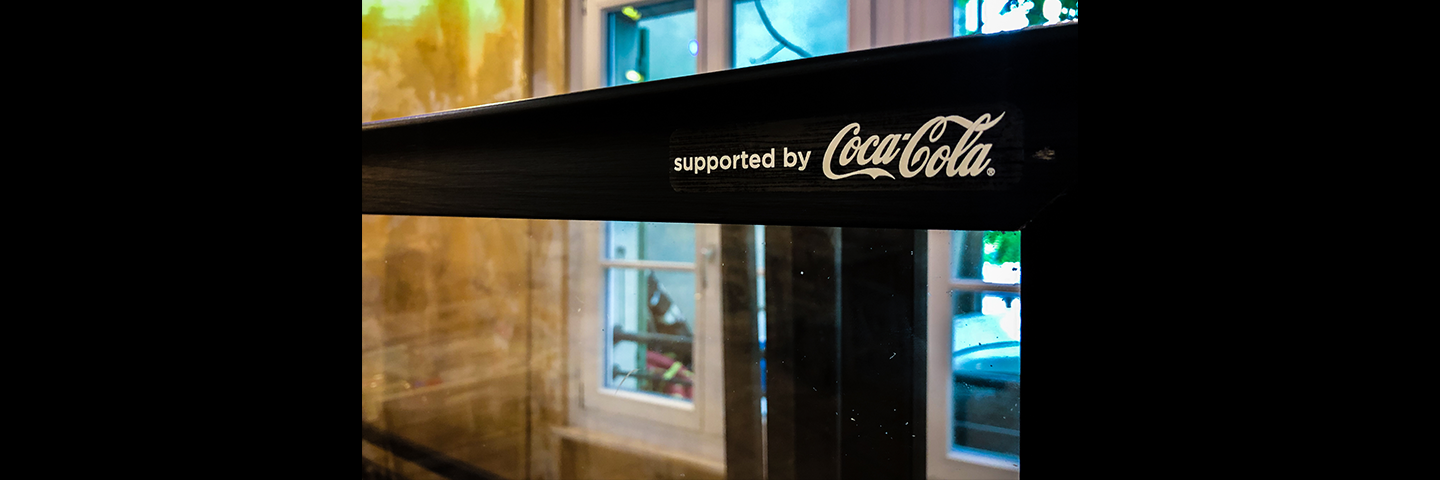 supported by Coca Cola door lable