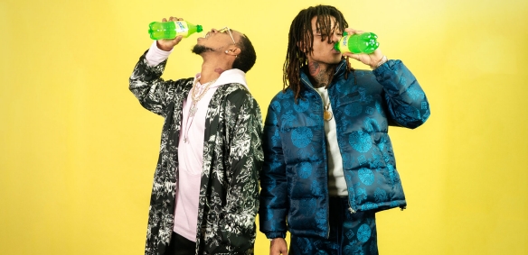 two boys drinking lymonade