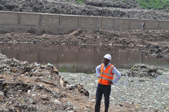 Samuel in front of the landfill that inspired his energy-generating idea.