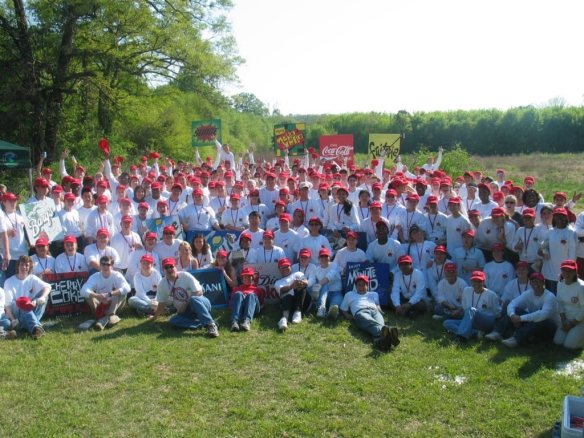 Samuel (middle left, waving hat) at his 2004 Coca-Cola Scholars Weekend as a high school senior.