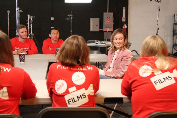 Olivia Wilde chats with the finalists during a training session in Los Angeles.