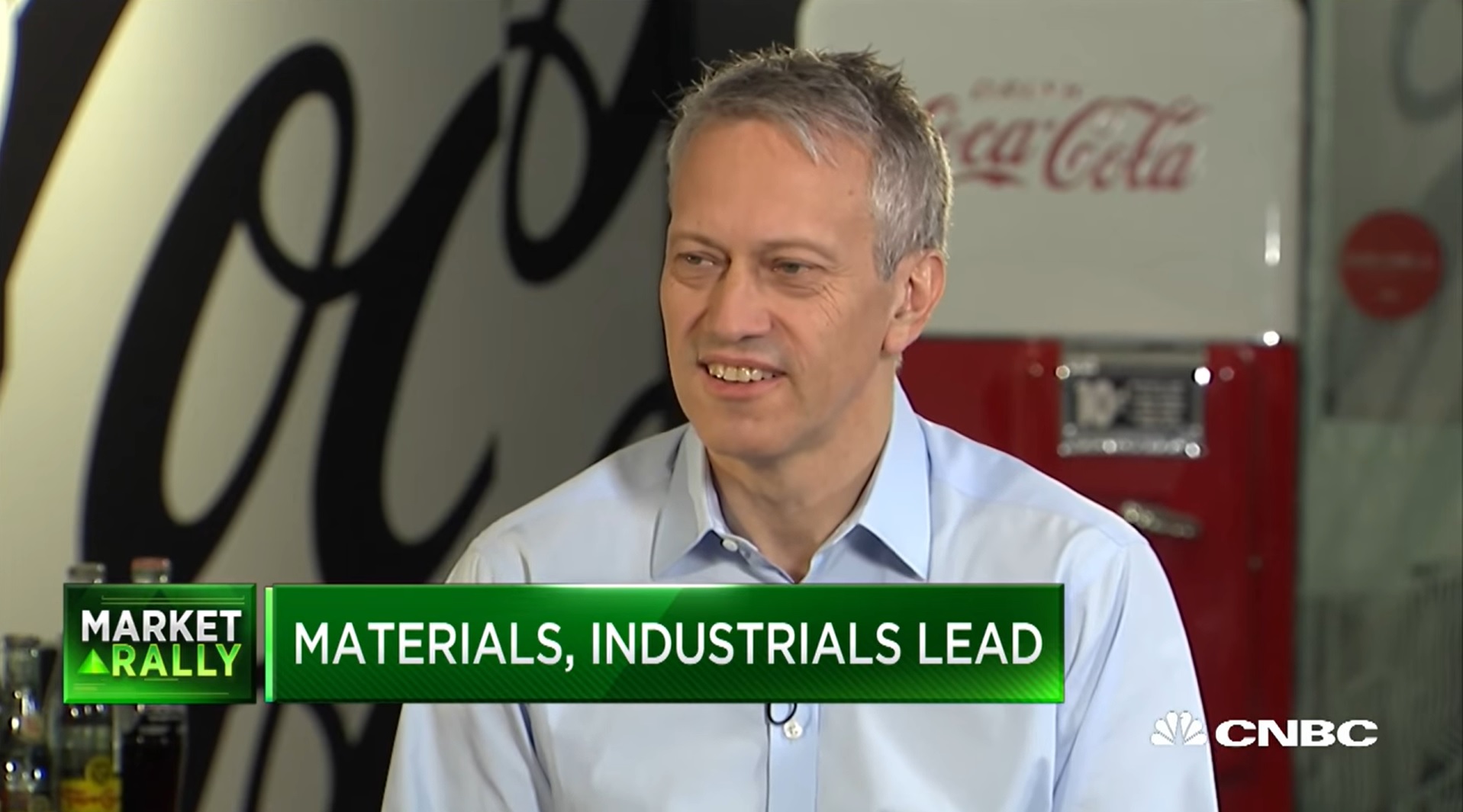 Coca-Cola CEO chatting with news person in Coca-Cola headquarters
