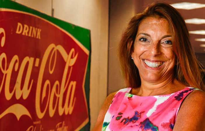 Headshot of Marie Quintero Johnson, The Coca-Cola Company