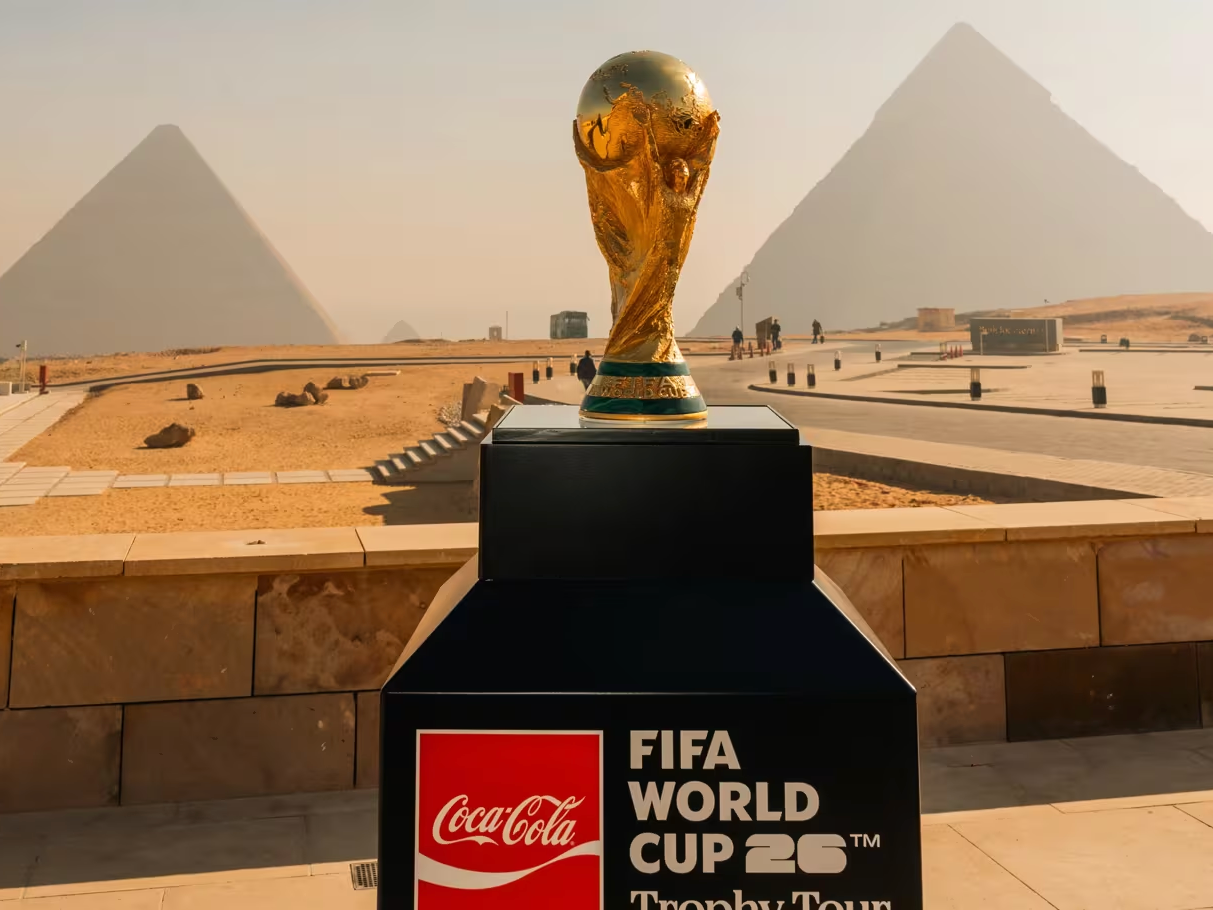 Trophy in front of Egyptian pyramids. 
