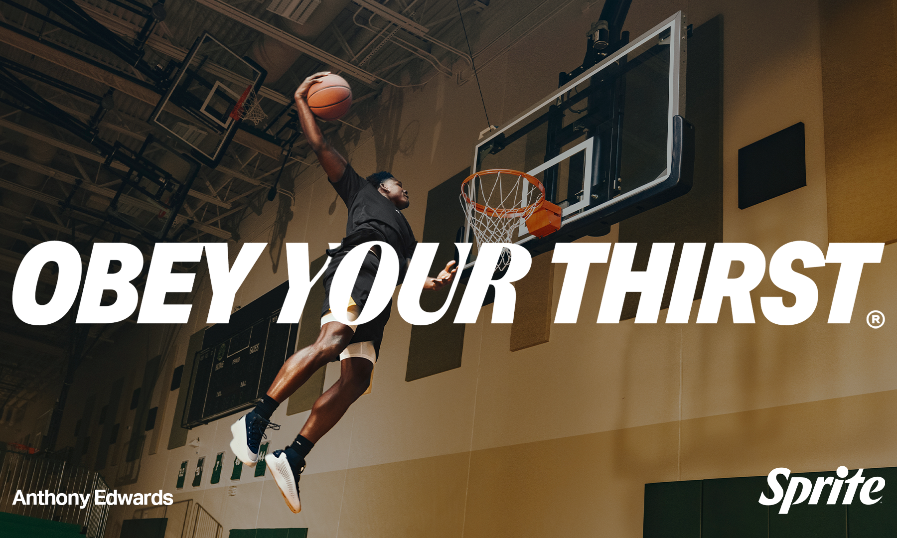 Man dunking basketball