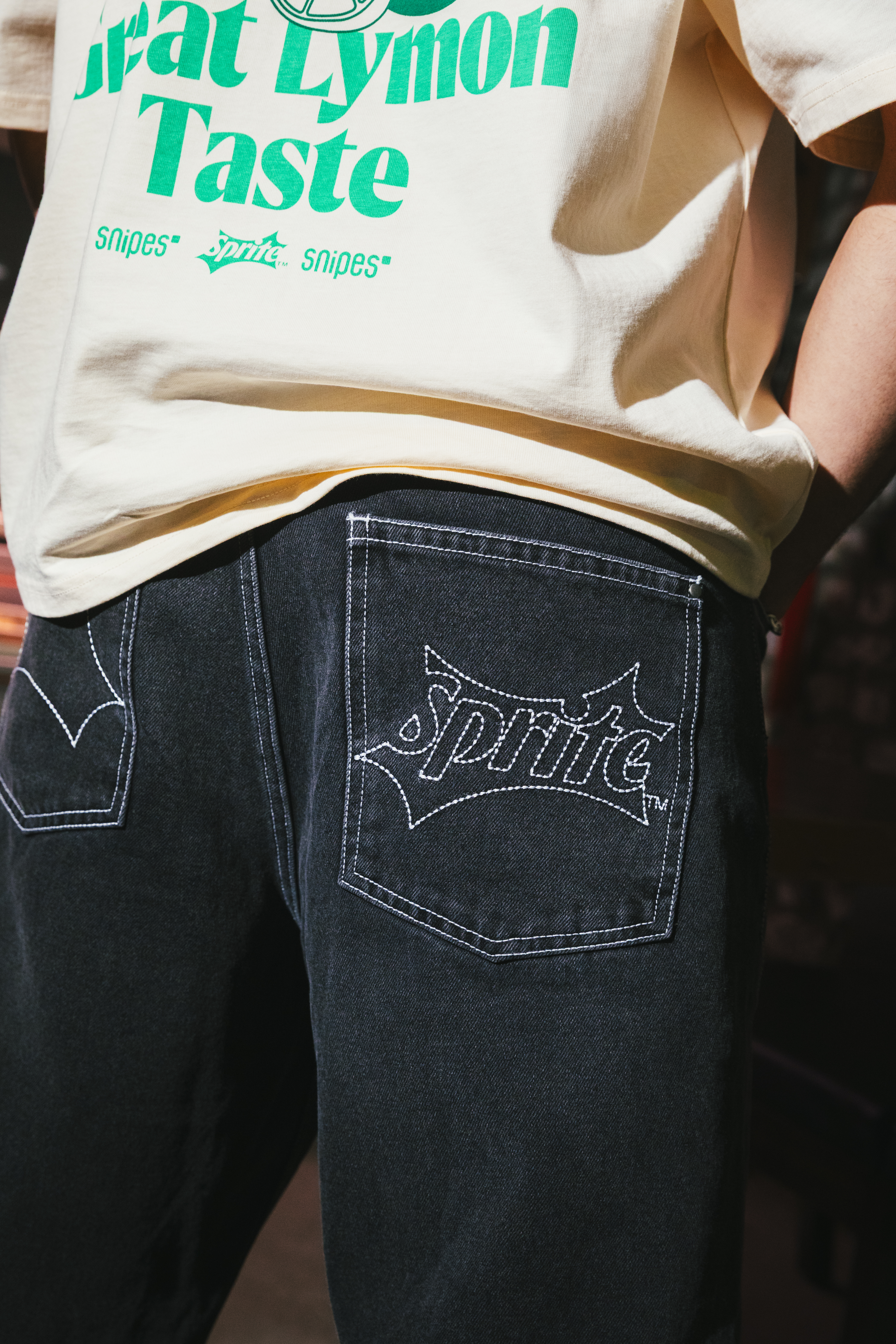 Sprite embroided on the back pocket of SNIPES x Sprite Denim