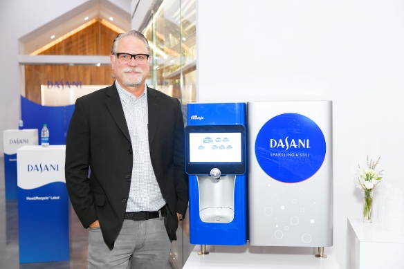 Chris Hellmann, VP and general manager, Coca-Cola Freestyle, with the DASANI PureFill dispenser.