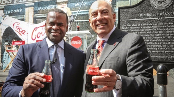 Atlanta Mayor Kasim Reed joins Coca-Cola Chairman and CEO Muhtar Kent and the Georgia Historical Society for the dedication of a historical marker at the intersection of Peachtree and Marietta streets, where the first Coca-Cola was served at Jacobs’ Pharmacy on May 8, 1886. Kent today announced that Coca-Cola will give $1.8 million to Atlanta’s Centennial Olympic Park District.