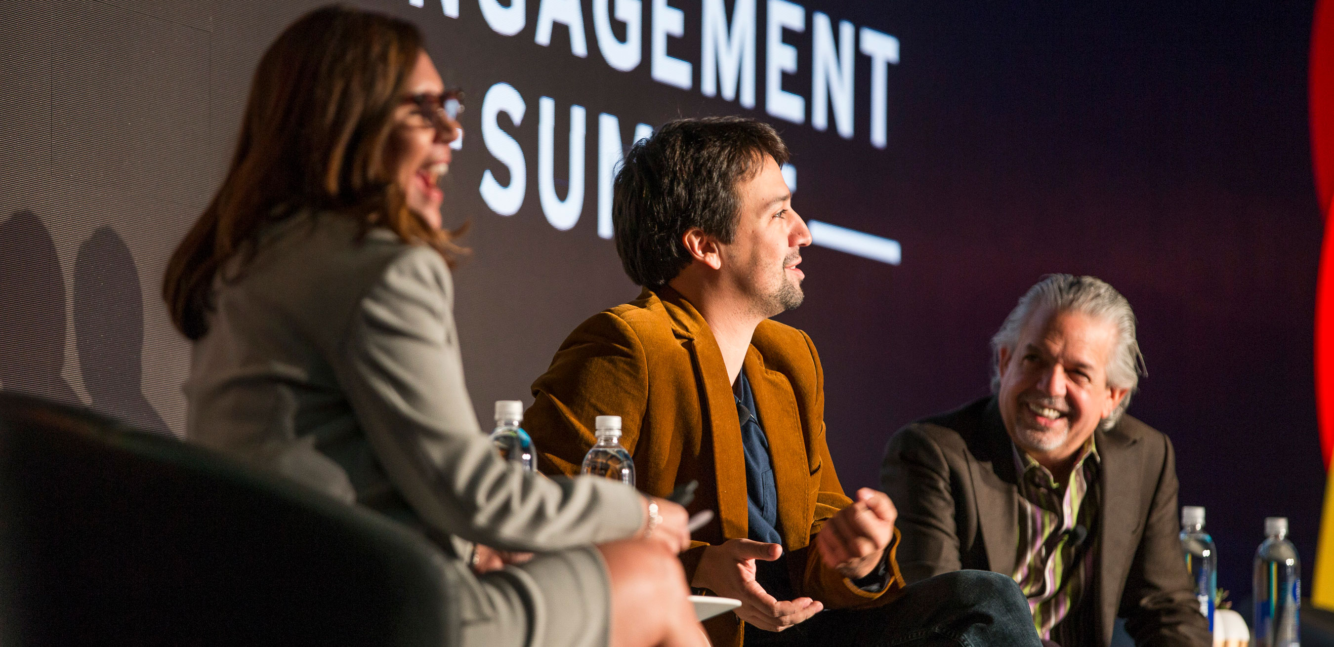 Alba Baylin, VP of community and stakeholder relations, Coca-Cola North America, interviews  Lin-Manuel Miranda (center) and Luis Miranda, Jr., at the first-ever Coca-Cola Community Engagement Summit on Oct. 21, 2019.  