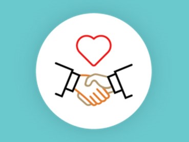 Icon with a heart over a handshake