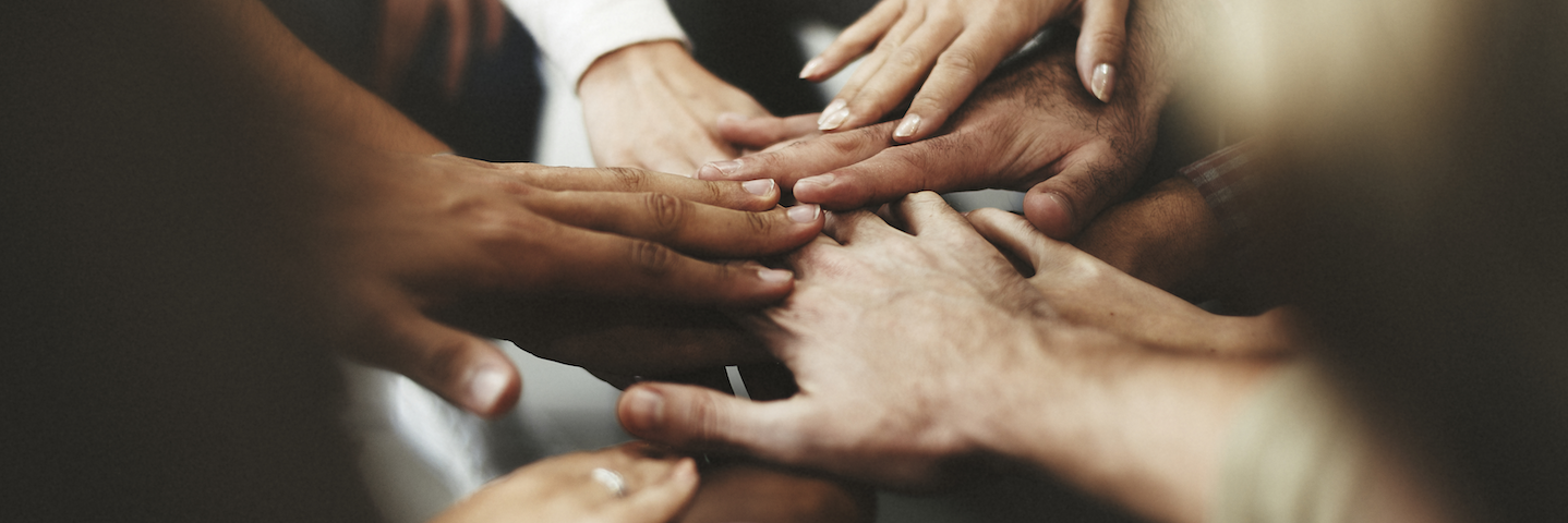 Hands of people supporting human rights