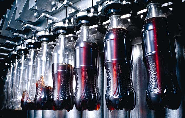 Coca-Cola bottles produced in bottling plant