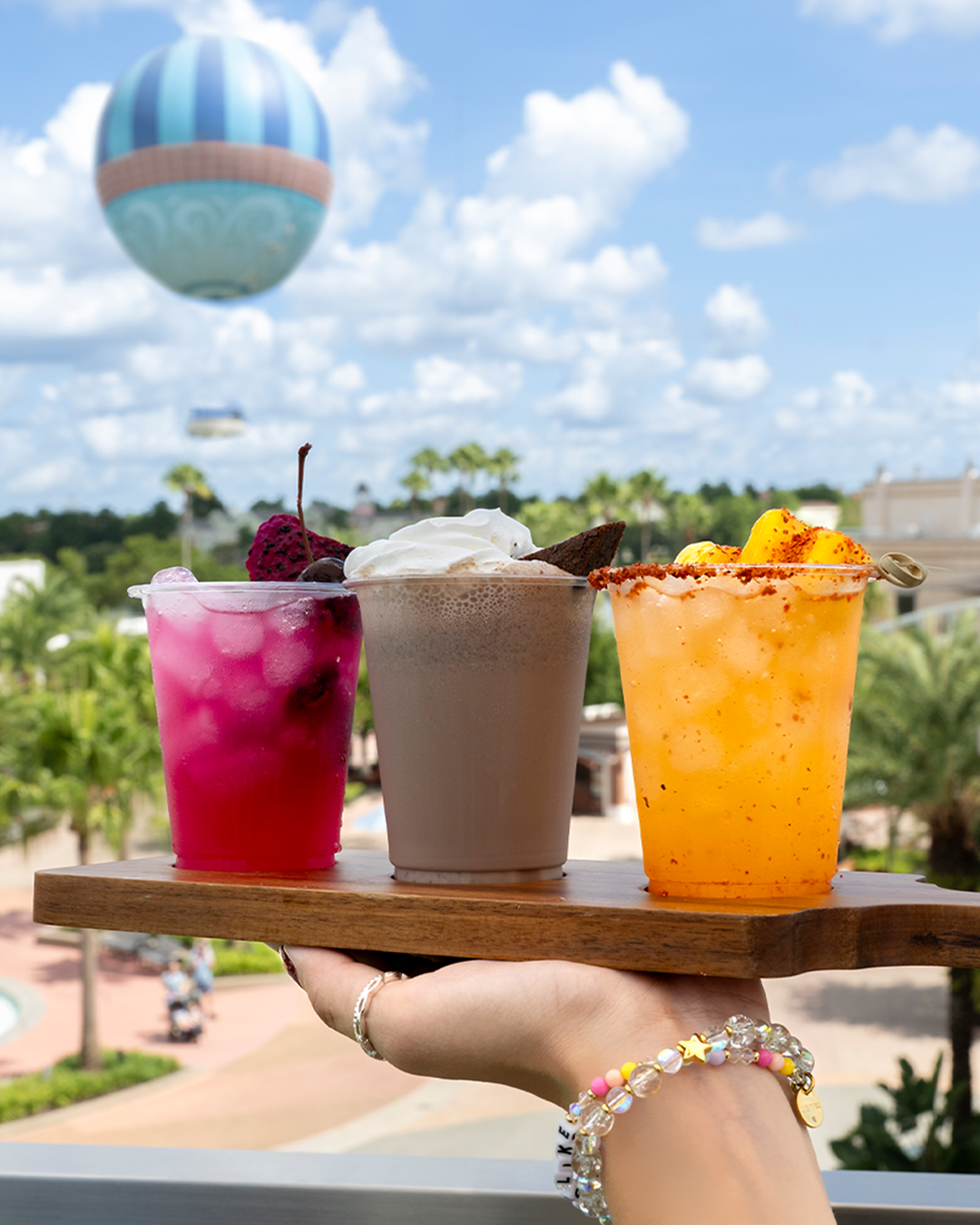 Pictured (left to right): "Dragonfruit Cherry Lemonade, Brownie Masher, and Mango Lime Kick