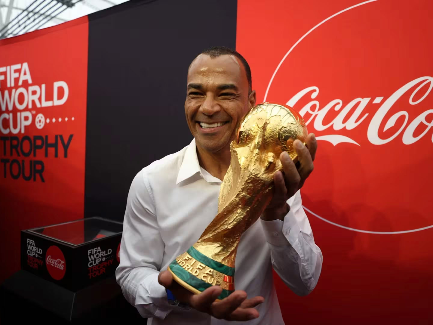 Man holding trophy