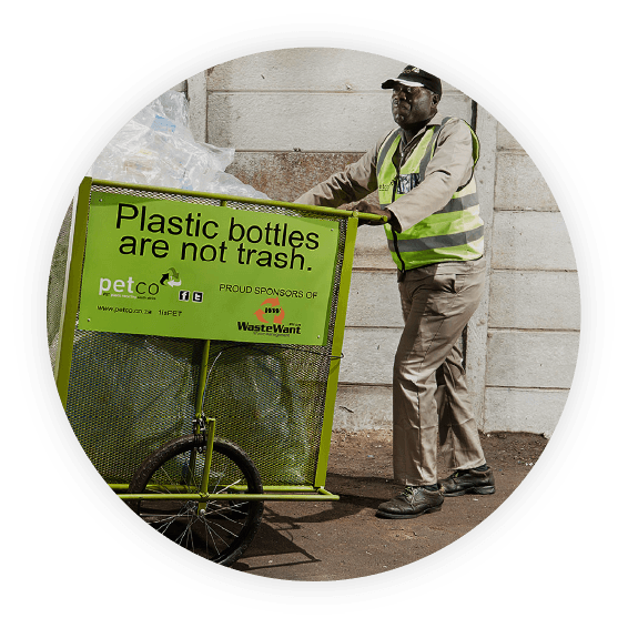 Man pushed PER Recycling Company cart filled with plastic bottles